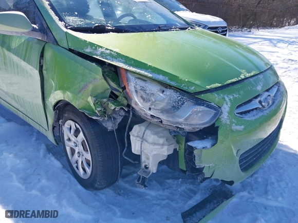 2013 Hyundai Accent GL with VIN KMHCT5AE5DU115490, listed as a IAAI auction lot 41598395 with 86,610 mi miles. Bid and sale history available at carsss.com. Image 6.