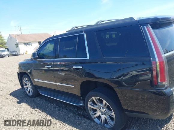 2015 Chevrolet Tahoe LT with VIN 1GNSKBKC5FR229193, listed as a IAAI auction lot 42079931 with Not provided miles and . Bid and sale history available at DreamBid. Image 13.