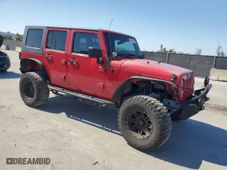 2010 Jeep Wrangler Unlimited Sport with VIN 1J4BA3H10AL171104, listed as a Copart auction lot 53656125 with 192,898 mi miles and Clean Title. Bid and sale history available at carsss.com. Image 4.