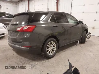 2019 Chevrolet Equinox LT with VIN 2GNAXKEV1K6157781, listed as a IAAI auction lot 41274846 with 128,425 mi miles and . Bid and sale history available at DreamBid. Image 4.