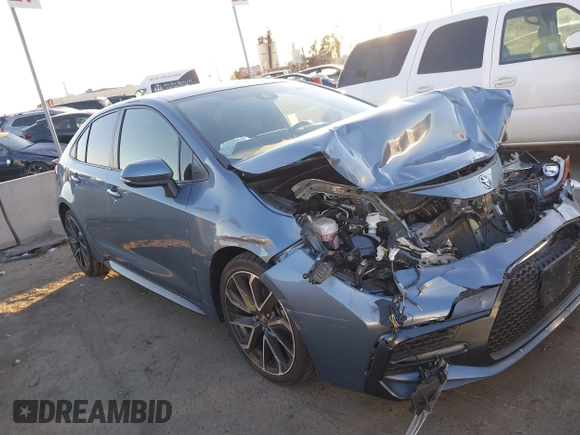 2022 Toyota Corolla SE with VIN JTDS4MCE9NJ082078, listed as a IAAI auction lot 41291406 with 57,202 mi miles and . Bid and sale history available at DreamBid. Image 13.
