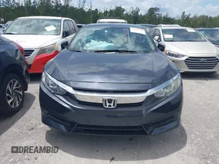 2016 Honda Civic Sedan LX with VIN 19XFC2F52GE069998, listed as a IAAI auction lot 42016233 with 93,990 mi miles. Bid and sale history available at carsss.com. Image 12.