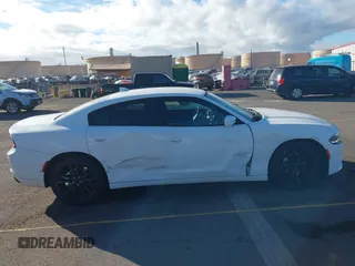 2015 Dodge Charger SXT z VIN 2C3CDXHG6FH847951, wystawiony jako IAAI lot #41094866 z przebiegiem 78 461 mil mil oraz . Historia ofert i sprzedaży dostępna na DreamBid. Obrazek 13.