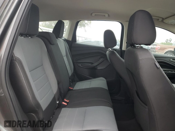 2017 Ford Escape S z VIN 1FMCU0F76HUD84825, wystawiony jako Copart lot #42800185 z przebiegiem 59 447 mil mil oraz Szkoda całkowita • Salvage title. Historia ofert i sprzedaży dostępna na DreamBid. Obrazek 11.