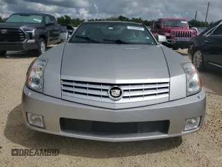 2006 Cadillac XLR z VIN 1G6YV36A365601441, wystawiony jako Copart lot #73945994 z przebiegiem Nie podano mil oraz Szkody całkowita. Historia ofert i sprzedaży dostępna na DreamBid. Obrazek 5.