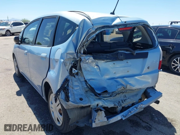 2009 Honda Fit z VIN JHMGE88259S037601, wystawiony jako IAAI lot #42428704 z przebiegiem 55 823 mil mil oraz . Historia ofert i sprzedaży dostępna na DreamBid. Obrazek 6.