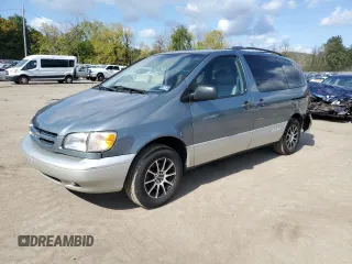 2000 Toyota Sienna LE with VIN 4T3ZF13C2YU286474, listed as a Copart auction lot 74230384 with 118,988 mi miles and Salvage Title. Bid and sale history available at carsss.com. Image 1.