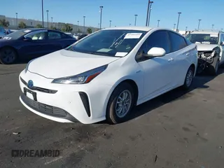 2021 Toyota Prius L Eco with VIN JTDKAMFU0M3149875, listed as a IAAI auction lot 41966010 with 99,542 mi miles. Bid and sale history available at carsss.com. Image 18.