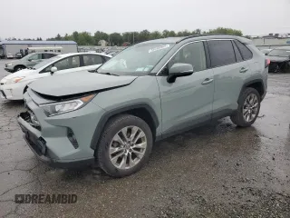 2021 Toyota RAV4 XLE Premium with VIN JTMA1RFV0MD074834, listed as a Copart auction lot 58466965 with 71,623 mi miles and Salvage title. Bid and sale history available at DreamBid. Image 1.