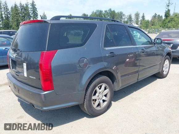 2008 Cadillac SRX RWD z VIN 1GYEE637180205948, wystawiony jako IAAI lot #42487005 z przebiegiem 203 458 mil mil oraz . Historia ofert i sprzedaży dostępna na DreamBid. Obrazek 4.