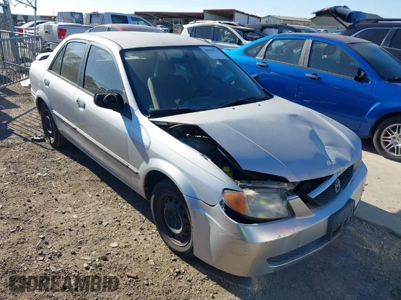 2001 Mazda Protege DX with VIN JM1BJ222810410482, listed as a IAAI auction lot 40799727 with 159,446 mi miles and . Bid and sale history available at DreamBid. Image 1.