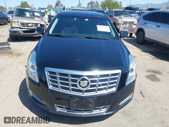 2013 Cadillac XTS Luxury z VIN 2G61P5S30D9220113, wystawiony jako IAAI lot #41970214 z przebiegiem 52 476 mil mil oraz . Historia ofert i sprzedaży dostępna na DreamBid. Obrazek 12.