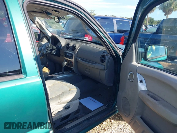 2004 Jeep Liberty Limited with VIN 1J4GK58K94W104382, listed as a IAAI auction lot 40214679 with 143,836 mi miles. Bid and sale history available at carsss.com. Image 5.