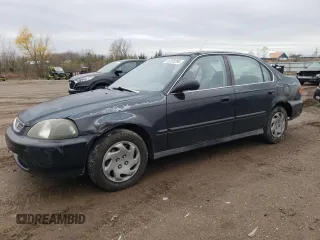 1997 Honda Civic EX with VIN 2HGEJ8641VH551960, listed as a Copart auction lot 82228294 with 178,054 mi miles and Clean Title. Bid and sale history available at carsss.com. Image 1.