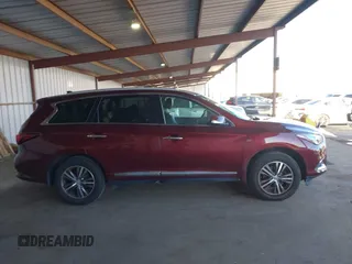 2019 Infiniti QX60 Luxe z VIN 5N1DL0MMXKC506230, wystawiony jako IAAI lot #41922656 z przebiegiem 63 621 mil mil oraz . Historia ofert i sprzedaży dostępna na DreamBid. Obrazek 13.