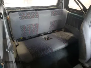 1996 Chevrolet Tracker z VIN 2CNBJ1869T6903842, wystawiony jako Copart lot #87734315 z przebiegiem 120 835 mil mil oraz Szkoda całkowita • Salvage title. Historia ofert i sprzedaży dostępna na DreamBid. Obrazek 11.