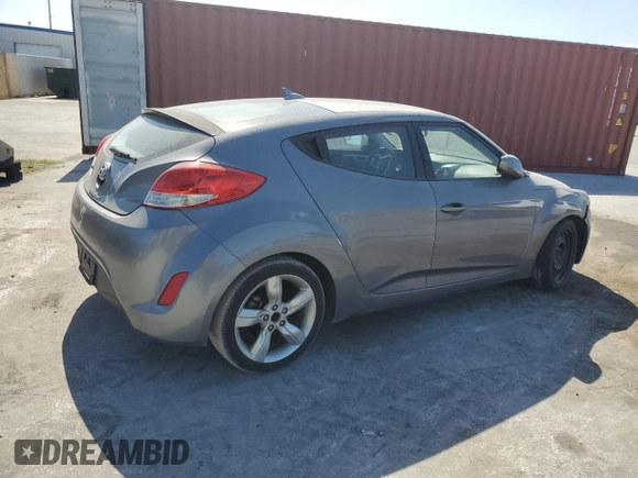 2012 Hyundai Veloster w/Black Int z VIN KMHTC6AD4CU046609, wystawiony jako Copart lot #54888045 z przebiegiem 152 997 mil mil oraz Szkoda całkowita • Salvage title. Historia ofert i sprzedaży dostępna na DreamBid. Obrazek 3.