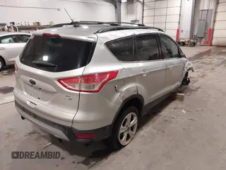2013 Ford Escape SE with VIN 1FMCU9GX7DUB89197, listed as a IAAI auction lot 42311546 with 131,263 mi miles and . Bid and sale history available at DreamBid. Image 4.