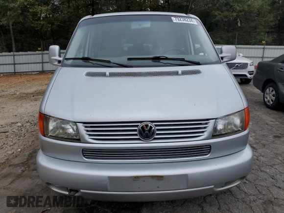 2002 Volkswagen EuroVan с VIN WV2KB47022H065941, выставлен на аукционе Copart как лот 79238234 с пробегом Не указан миль и Чистый • Clean title. История ставок и продаж доступна на DreamBid. Изображение 5.