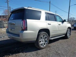 2016 GMC Yukon Denali with VIN 1GKS2CKJ5GR393269, listed as a IAAI auction lot 41963630 with 158,584 mi miles and . Bid and sale history available at DreamBid. Image 4.