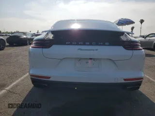 2018 Porsche Panamera 4 E-Hybrid z VIN WP0AE2A75JL130885, wystawiony jako Copart lot #55447835 z przebiegiem 76 932 mil mil oraz Szkoda całkowita • Salvage title. Historia ofert i sprzedaży dostępna na DreamBid. Obrazek 6.