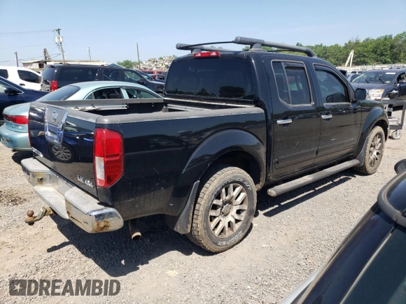 2010 Nissan Frontier Pro-4X with VIN 1N6AD0EV1AC447205, listed as a Copart auction lot 62007355 with 128,371 mi miles and Clean title. Bid and sale history available at DreamBid. Image 3.