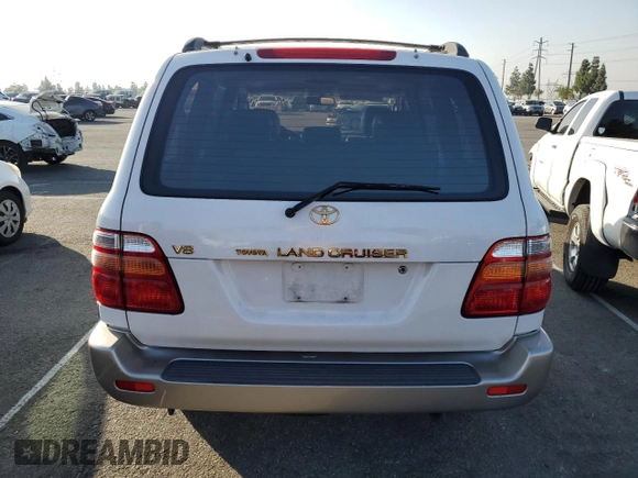 2002 Toyota Land Cruiser z VIN JTEHT05J022020635, wystawiony jako Copart lot #80284764 z przebiegiem Nie podano mil oraz Szkoda całkowita • Salvage title. Historia ofert i sprzedaży dostępna na DreamBid. Obrazek 6.
