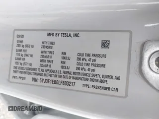 2020 Tesla Model 3 Long Range with VIN 5YJ3E1EB0LF803217, listed as a IAAI auction lot 41871940 with 130,391 mi miles. Bid and sale history available at carsss.com. Image 9.