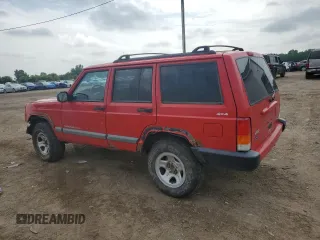 1999 Jeep Cherokee Sport with VIN 1J4FF68S4XL580048, listed as a Copart auction lot 62546365 with 154,059 mi miles and Clean title. Bid and sale history available at DreamBid. Image 2.