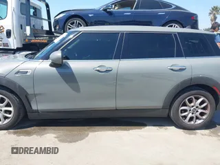 2019 MINI Clubman Cooper with VIN WMWLN5C57K2E34894, listed as a IAAI auction lot 42072962 with 49,274 mi miles and . Bid and sale history available at DreamBid. Image 14.