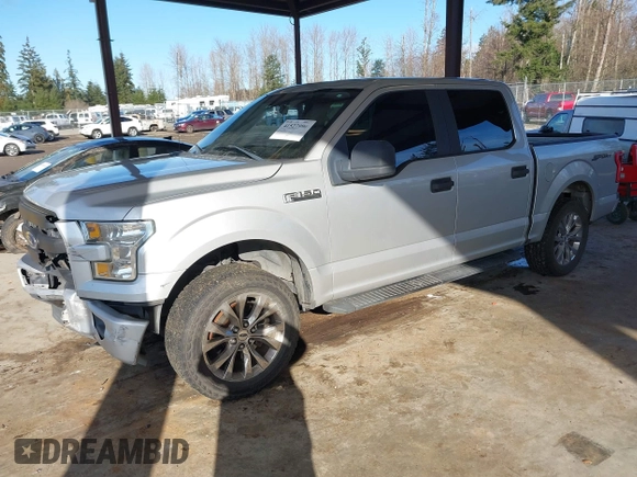 2015 Ford F-150 XLT with VIN 1FTEW1C86FKE85267, listed as a IAAI auction lot 41527996 with 119,800 mi miles and . Bid and sale history available at carsss.com. Image 17.