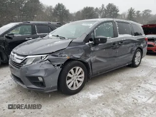 2018 Honda Odyssey LX with VIN 5FNRL6H28JB013928, listed as a Copart auction lot 87695025 with 194,390 mi miles and Salvage Title. Bid and sale history available at carsss.com. Image 1.