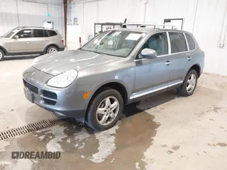 2004 Porsche Cayenne S with VIN WP1AB29P54LA69098, listed as a IAAI auction lot 41619941 with 236,820 mi miles. Bid and sale history available at carsss.com. Image 2.