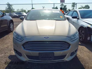 2015 Ford Fusion SE Hybrid with VIN 3FA6P0LU7FR243498, listed as a IAAI auction lot 42719986 with 345,098 mi miles and . Bid and sale history available at DreamBid. Image 6.