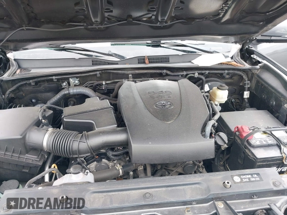 2017 Toyota Tacoma SR5 z VIN 3TMAZ5CN7HM045752, wystawiony jako IAAI lot #42057874 z przebiegiem 89 898 mil mil oraz . Historia ofert i sprzedaży dostępna na DreamBid. Obrazek 10.