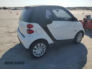 2012 Smart fortwo Pure z VIN WMEEJ3BA5CK540092, wystawiony jako Copart lot #75701964 z przebiegiem 59 355 mil mil oraz Szkody całkowita. Historia ofert i sprzedaży dostępna na DreamBid. Obrazek 3.