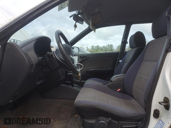 1996 Subaru Legacy Outback with VIN 4S3BG6850T7971454, listed as a Copart auction lot 52082395 with 173,542 mi miles and Salvage title. Bid and sale history available at DreamBid. Image 7.