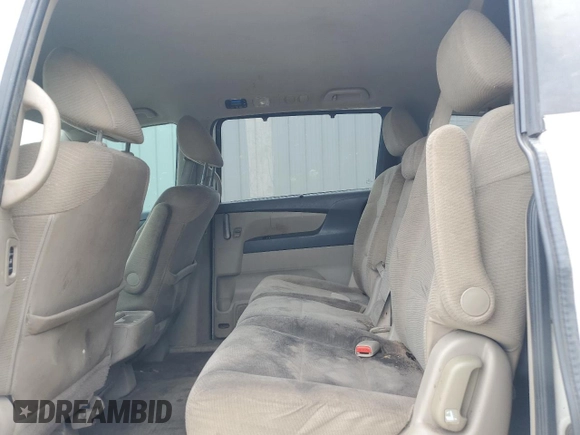 2013 Honda Odyssey EX z VIN 5FNRL5H43DB055987, wystawiony jako Copart lot #54001985 z przebiegiem 162 448 mil mil oraz Szkody całkowita. Historia ofert i sprzedaży dostępna na DreamBid. Obrazek 11.