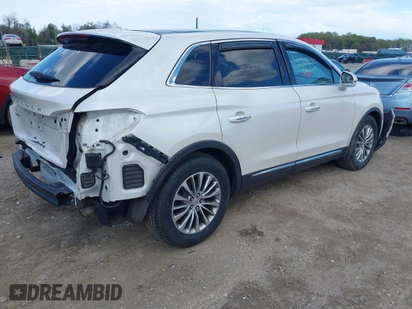2016 Lincoln MKX Select with VIN 2LMPJ6KR7GBL59266, listed as a IAAI auction lot 42044990 with 131,233 mi miles. Bid and sale history available at carsss.com. Image 4.