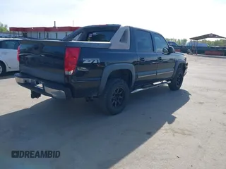 2003 Chevrolet Avalanche with VIN 3GNEK13T33G332498, listed as a IAAI auction lot 42060369 with 176,196 mi miles. Bid and sale history available at carsss.com. Image 4.