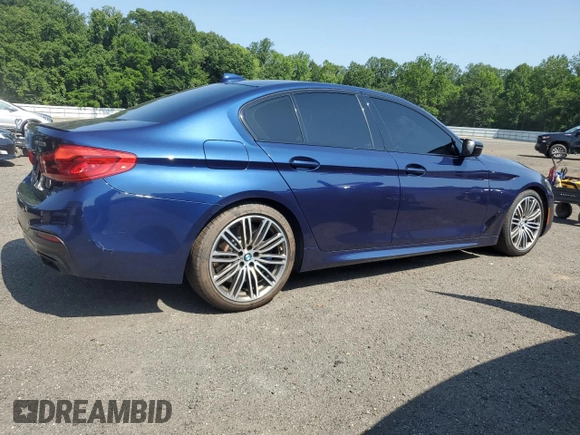 2020 BMW 5 Series M550i xDrive with VIN WBAJS7C0XLBN96338, listed as a Copart auction lot 60591815 with 73,910 mi miles and Salvage title. Bid and sale history available at DreamBid. Image 3.
