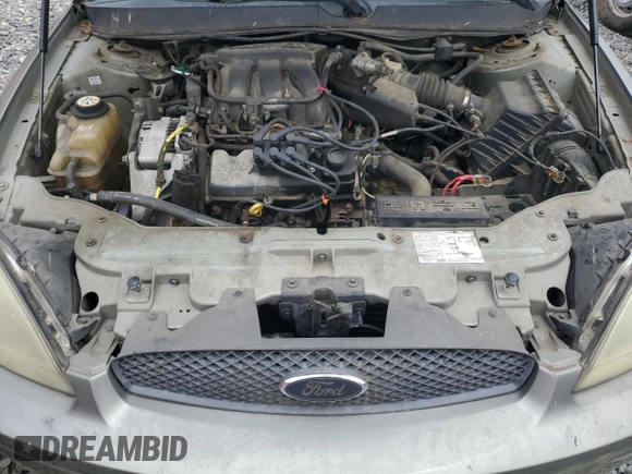 2004 Ford Taurus SE with VIN 1FAFP53274A193186, listed as a Copart auction lot 60255125 with 184,493 mi miles and Salvage title. Bid and sale history available at DreamBid. Image 11.