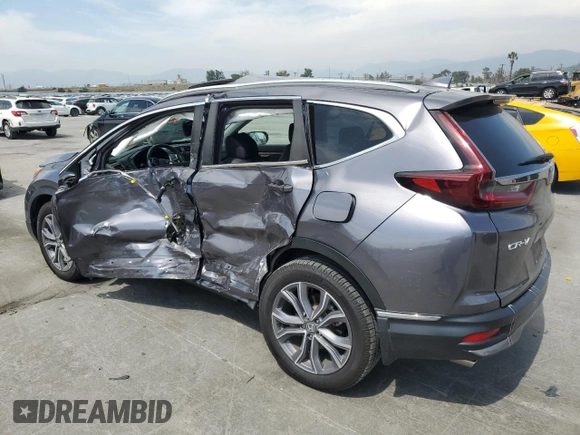 2022 Honda CR-V Touring z VIN 7FARW2H96NE052072, wystawiony jako Copart lot #52214465 z przebiegiem 63 832 mil mil oraz Szkoda całkowita • Salvage title. Historia ofert i sprzedaży dostępna na DreamBid. Obrazek 2.