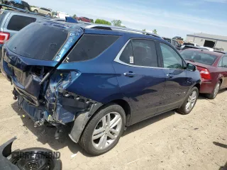 2021 Chevrolet Equinox Premier z VIN 2GNAXXEV0M6133133, wystawiony jako Copart lot #58995075 z przebiegiem 39 599 mil mil oraz Szkoda całkowita • Salvage title. Historia ofert i sprzedaży dostępna na DreamBid. Obrazek 3.