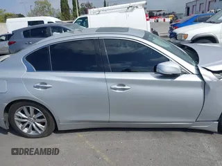 2014 Infiniti Q50 Premium z VIN JN1BV7AP9EM684709, wystawiony jako IAAI lot #41901877 z przebiegiem 91 425 mil mil oraz . Historia ofert i sprzedaży dostępna na DreamBid. Obrazek 14.