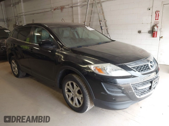 2011 Mazda CX-9 Touring with VIN JM3TB2CV1B0300621, listed as a IAAI auction lot 42002068 with 185,162 mi miles and . Bid and sale history available at carsss.com. Image 1.
