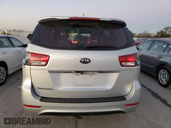 2018 Kia Sedona L with VIN KNDMA5C19J6397660, listed as a Copart auction lot 81271054 with 142,388 mi miles and Salvage Title. Bid and sale history available at carsss.com. Image 6.