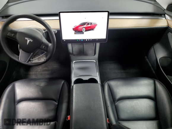 2023 Tesla Model 3 with VIN 5YJ3E1EA6PF455789, listed as a Copart auction lot 54715665 with 64,658 mi miles and Salvage Title. Bid and sale history available at DreamBid. Image 8.
