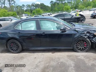 2023 Toyota Camry SE with VIN 4T1G11AK6PU829509, listed as a IAAI auction lot 42009085 with 35,864 mi miles and . Bid and sale history available at DreamBid. Image 13.