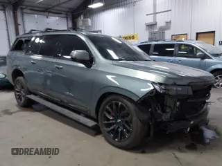 2024 Cadillac Escalade z VIN 1GYS4RKT7RR230923, wystawiony jako IAAI lot #41073003 z przebiegiem 9 513 mil mil oraz . Historia ofert i sprzedaży dostępna na DreamBid. Obrazek 1.